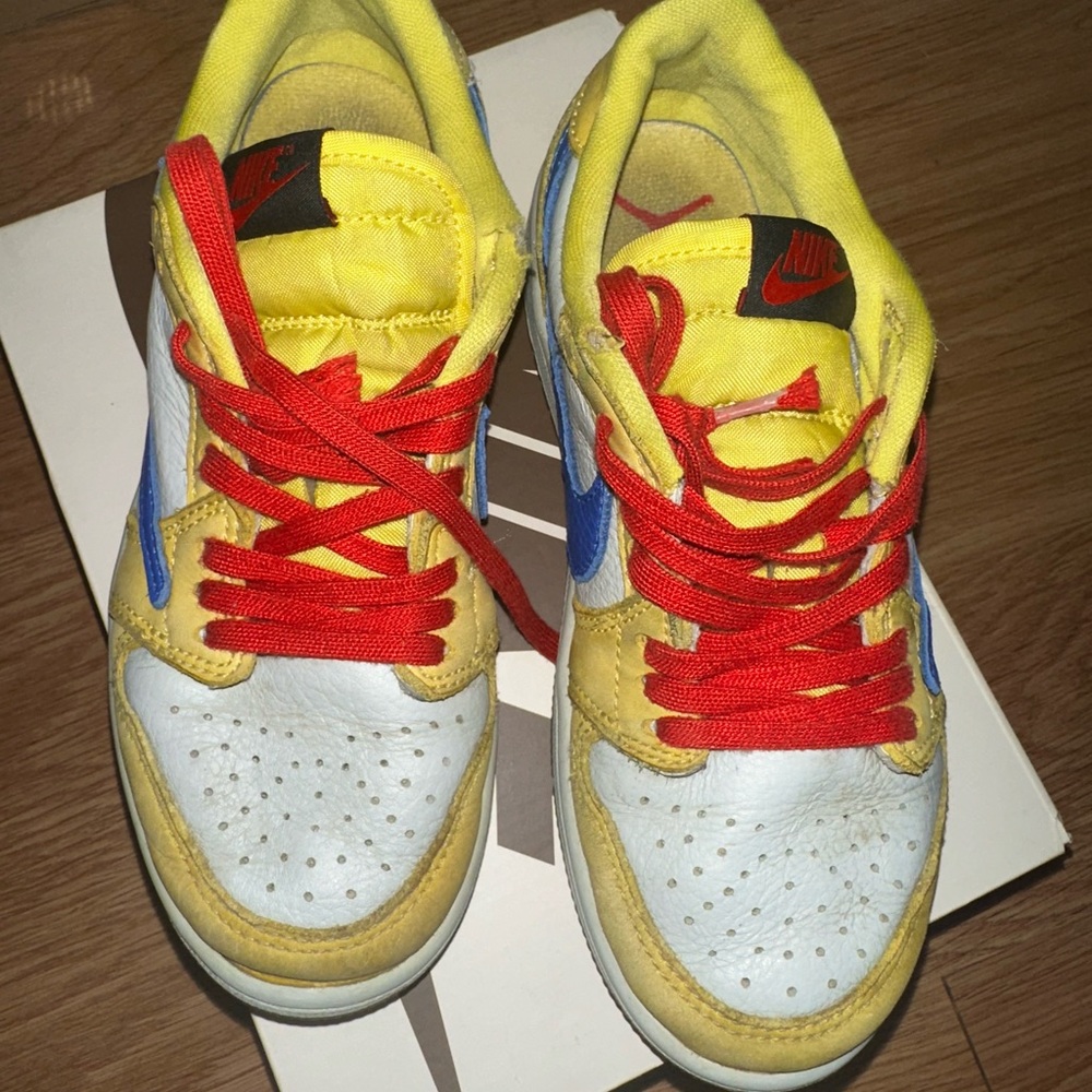 Travis Scott Nike Kids Yellow and Red Sneakers with Blue Accents